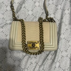 Chanel ivory rock chain small boy bag